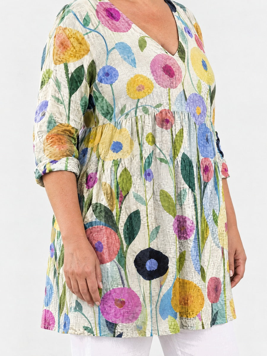 Nellie long blouse side view on a plus-size model