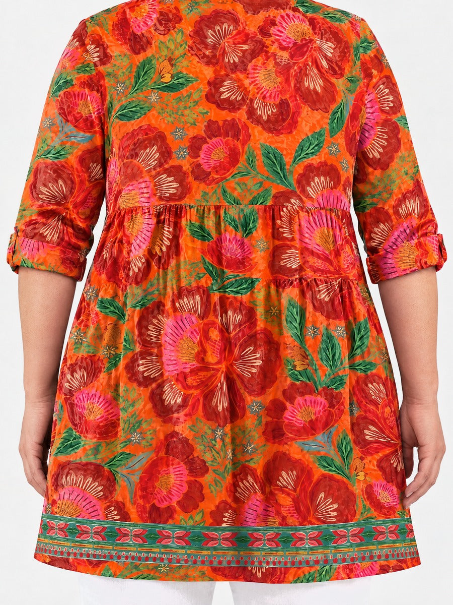 Priscilla long blouse back view on a plus-size model