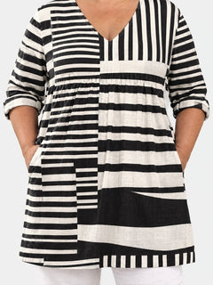 Sienna long blouse front view on a plus-size model