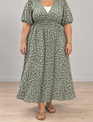 Sophia V-neck print maxi dress in green on a plus-size model