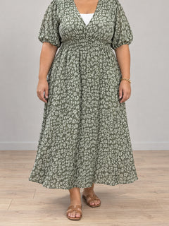 Sophia V-neck print maxi dress in green on a plus-size model
