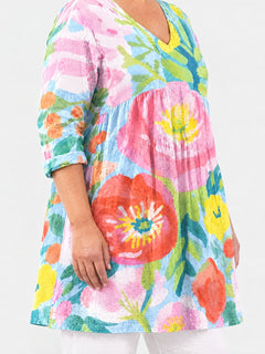 Valerie long blouse side view on a plus-size model